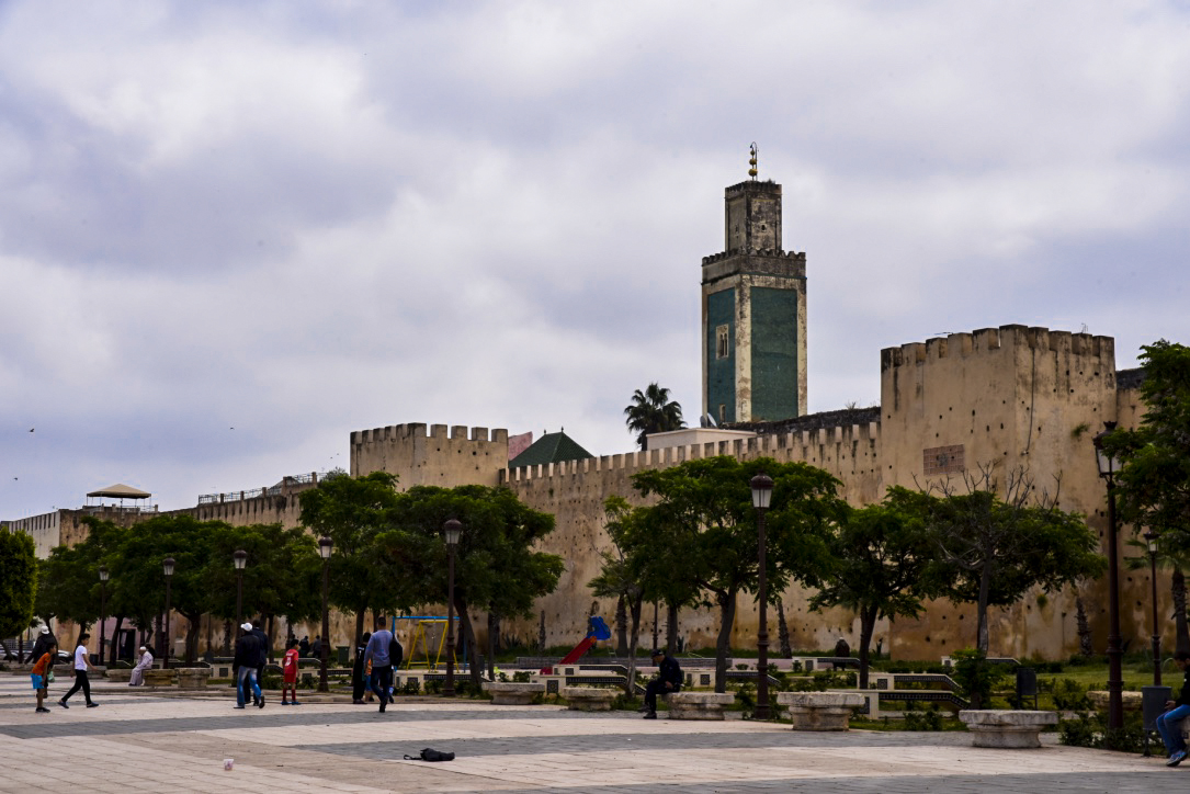Bustling markets, ancient architecture, and lively atmosphere of this historic Moroccan landmark.